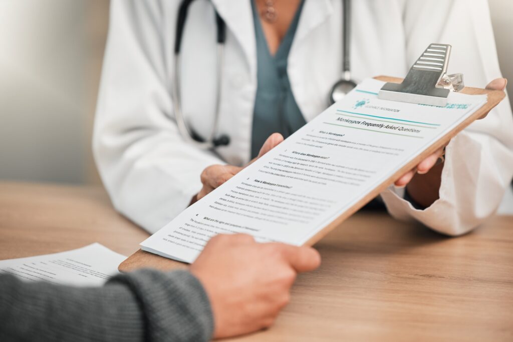 Doctor consulting patient